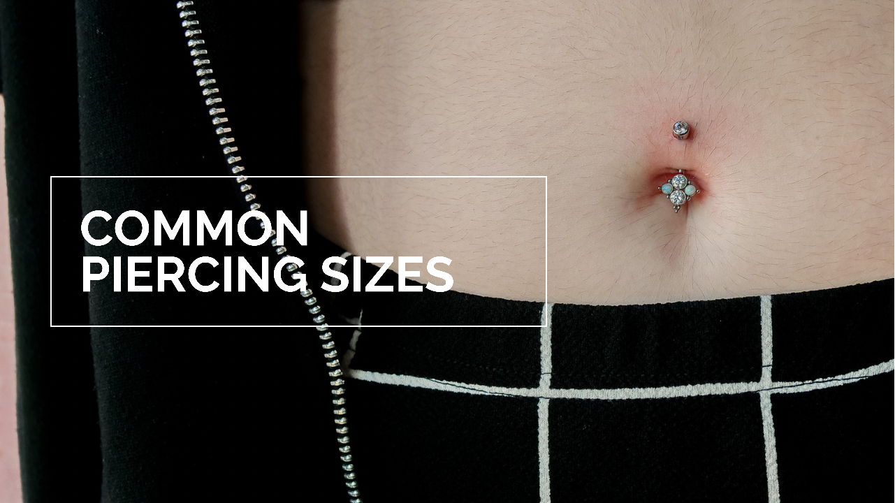 navel piercing with a unique banana curve belly button ring