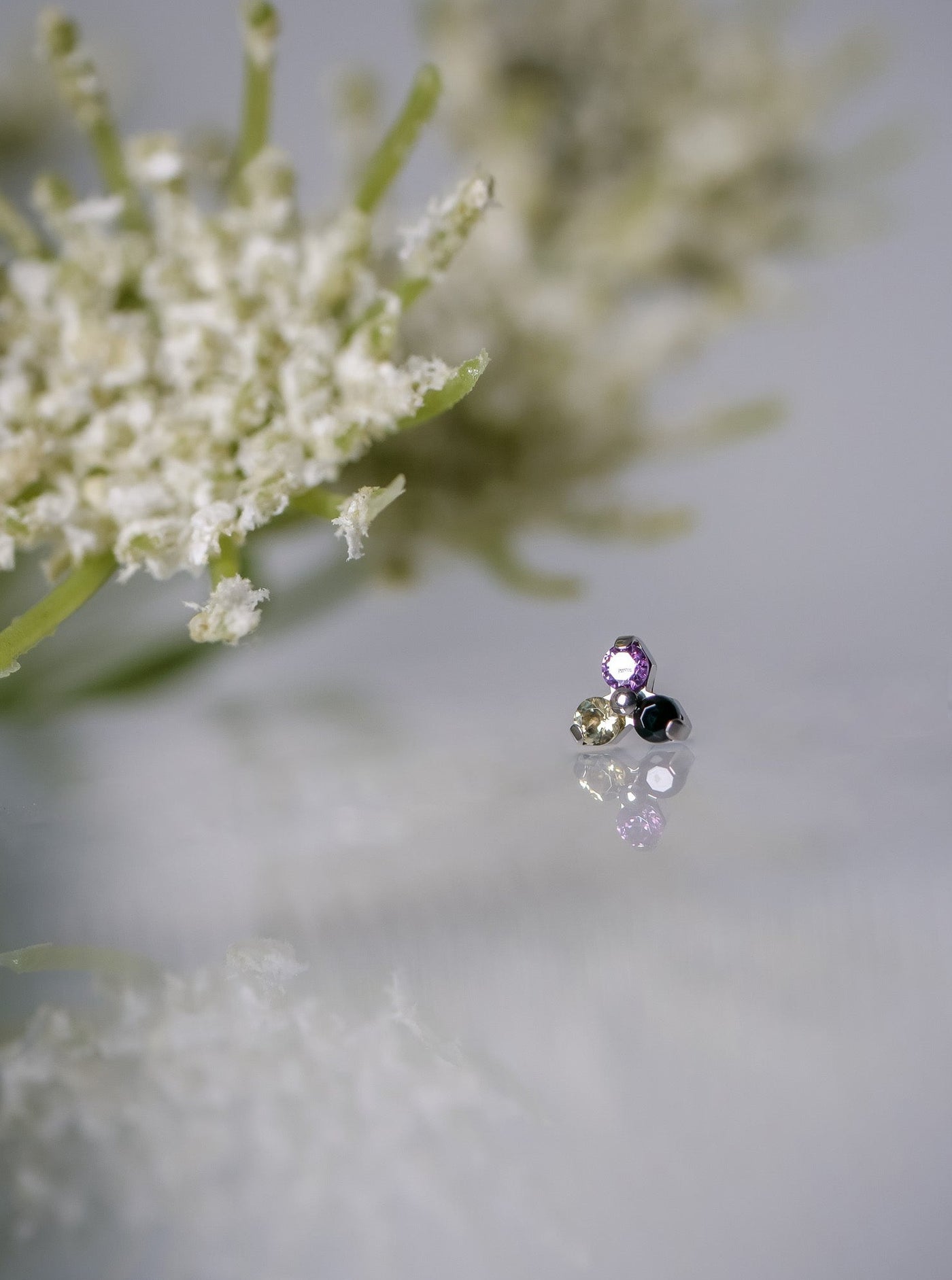 non binary gemstones in a cute flower like stud