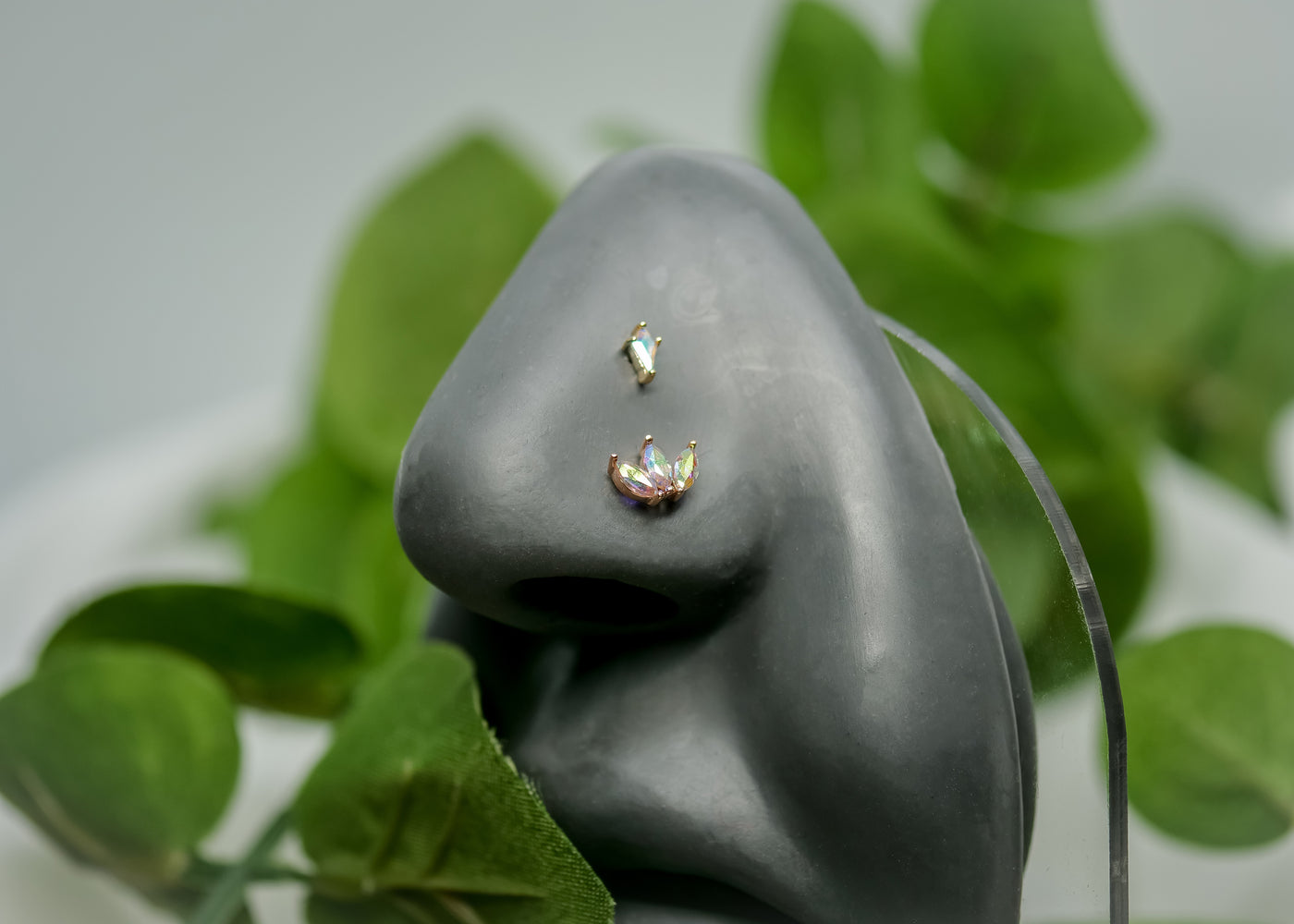 14K Rose Gold Moet  Mercury Mist Topaz featuring Triple  Swarovski Zirconia gems. Shown in Nostril with another Item not included in the price.  Threadless End