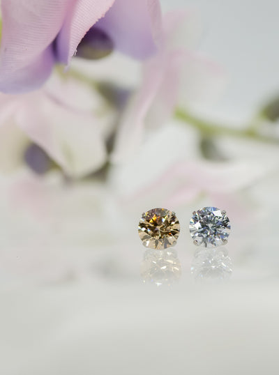 champagne and clear prong set gems 