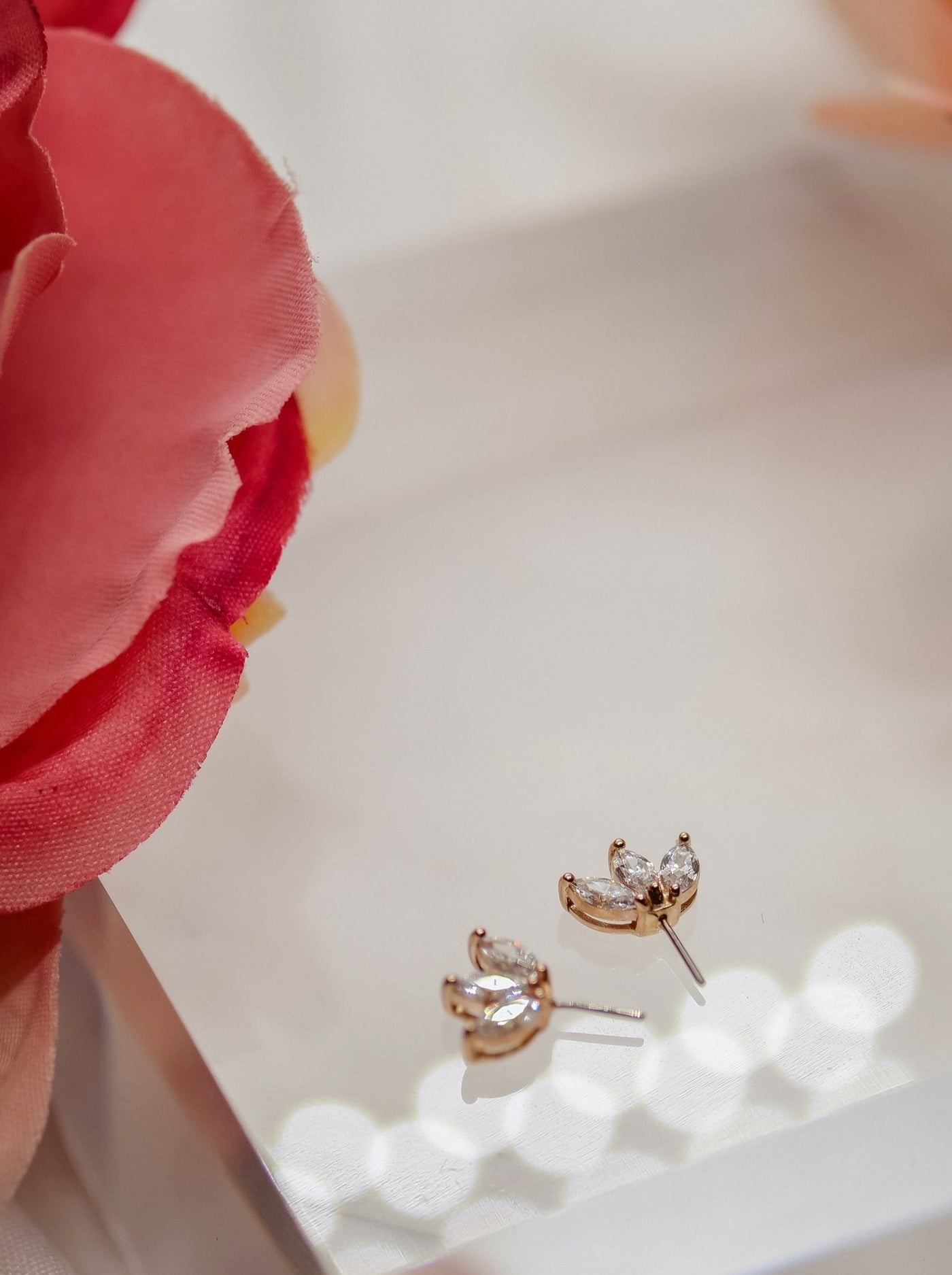 Moet - A forward-facing 14K Rose Gold setting,  featuring 3 Swarovski Marquise-cut Brilliant Cubic Zirconia Gems for Nipple, Helix, Industrial.  By Buddha Organics Jewelry.  Threadless End